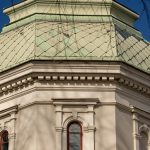 Close-up of an architectural dome with ornate design in Jönköping, Sweden, under blue sky.